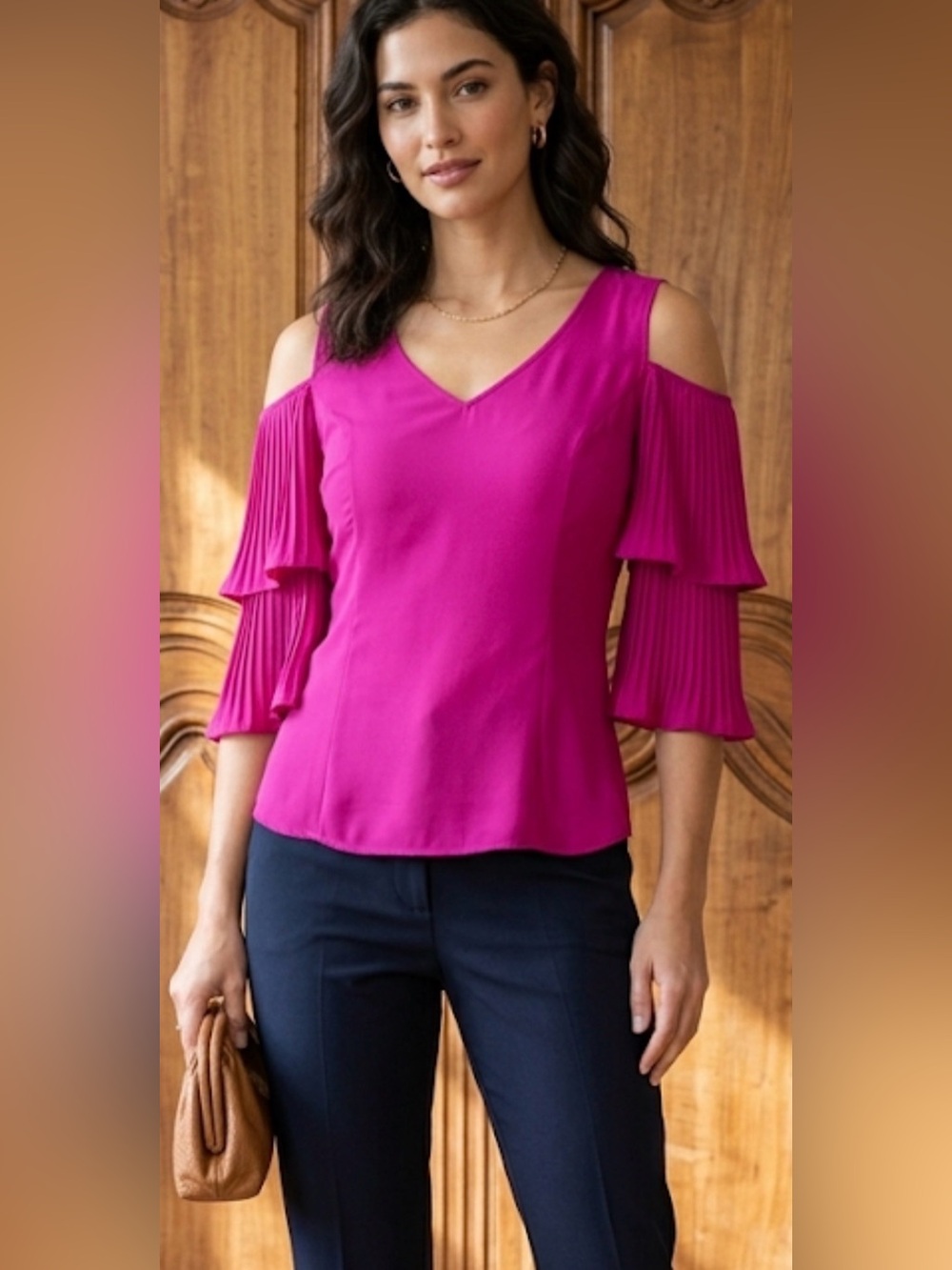 Ramy Brook pink/purple cold-shoulder top with ruffled sleeves.